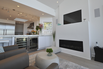 Neo-Lith Counter Tops with Doubled Wine Fridge, Linar Fireplace & Recessed TV