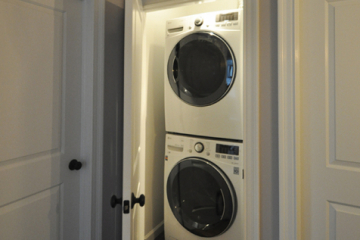 Stackable Washer & Dryer Moved Into a 2nd Floor Hallway, with Custom Tile Pan.